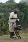Mike prepares breakfast out on the mara