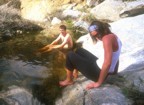 Eric takes a dip in the brook while Lori gives him "alpine curtesy"